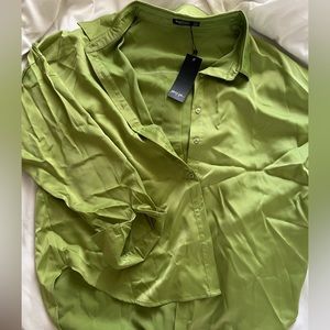 NastyGal oversized green satin button down shirt.